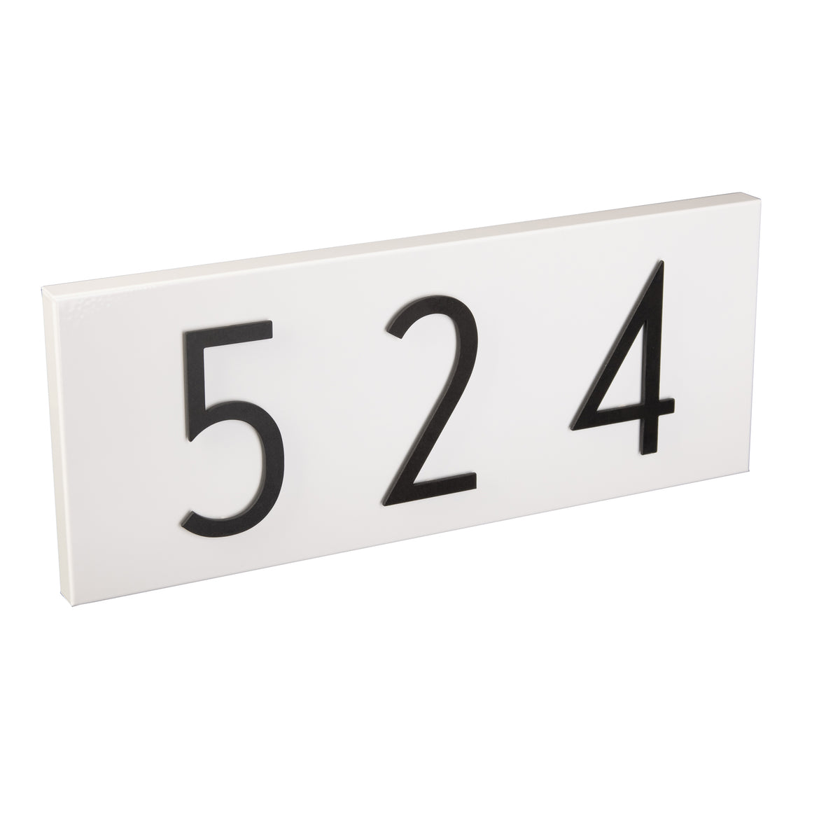 white address plaque with black numbers